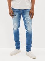 Jeans Desgastados con Roturas