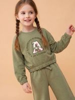 Polerón Estampado Frontal con Terminación Ajustada