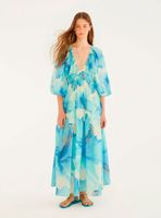 Vestido con Mangas Aglobadas Diseño Maxi Flores