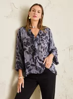 Blusa Puño Englobando la Manga