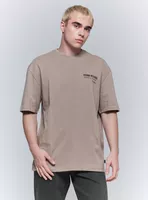 Polera Oversize Estampado Texto Espalda