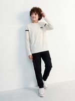 Pantalón de Buzo Cargo y Corte Frontales