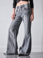 Jeans Flare Detalle Bolsillos Delanteros Tiro Medio