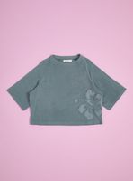 Polera Acid Wash con Aplicación Flor