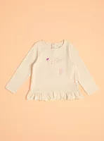 Polera con Estampado Frontal y Vuelos Abajo