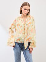 Blusa Fluida con Vuelos