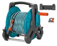 Enrollador de manguera + manguera Gardena.