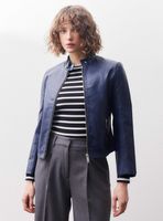 Chaqueta con Cierre y Botón