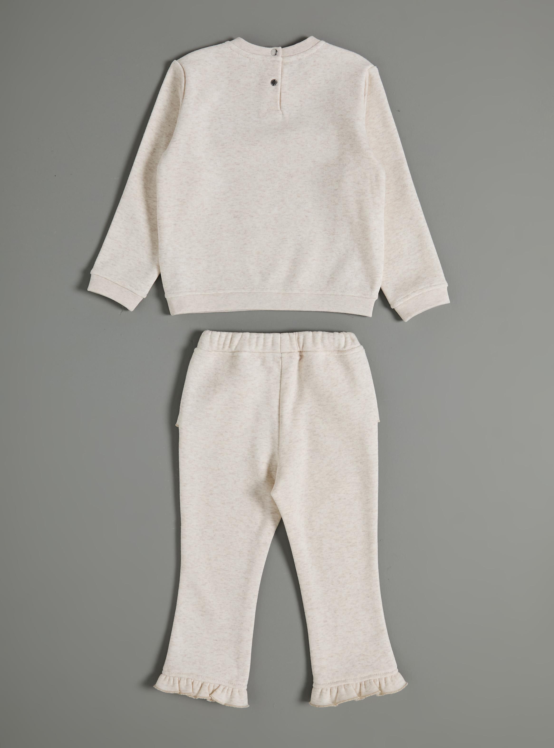 Buzo Bordado Romántico y Vuelitos en Ruedo-2