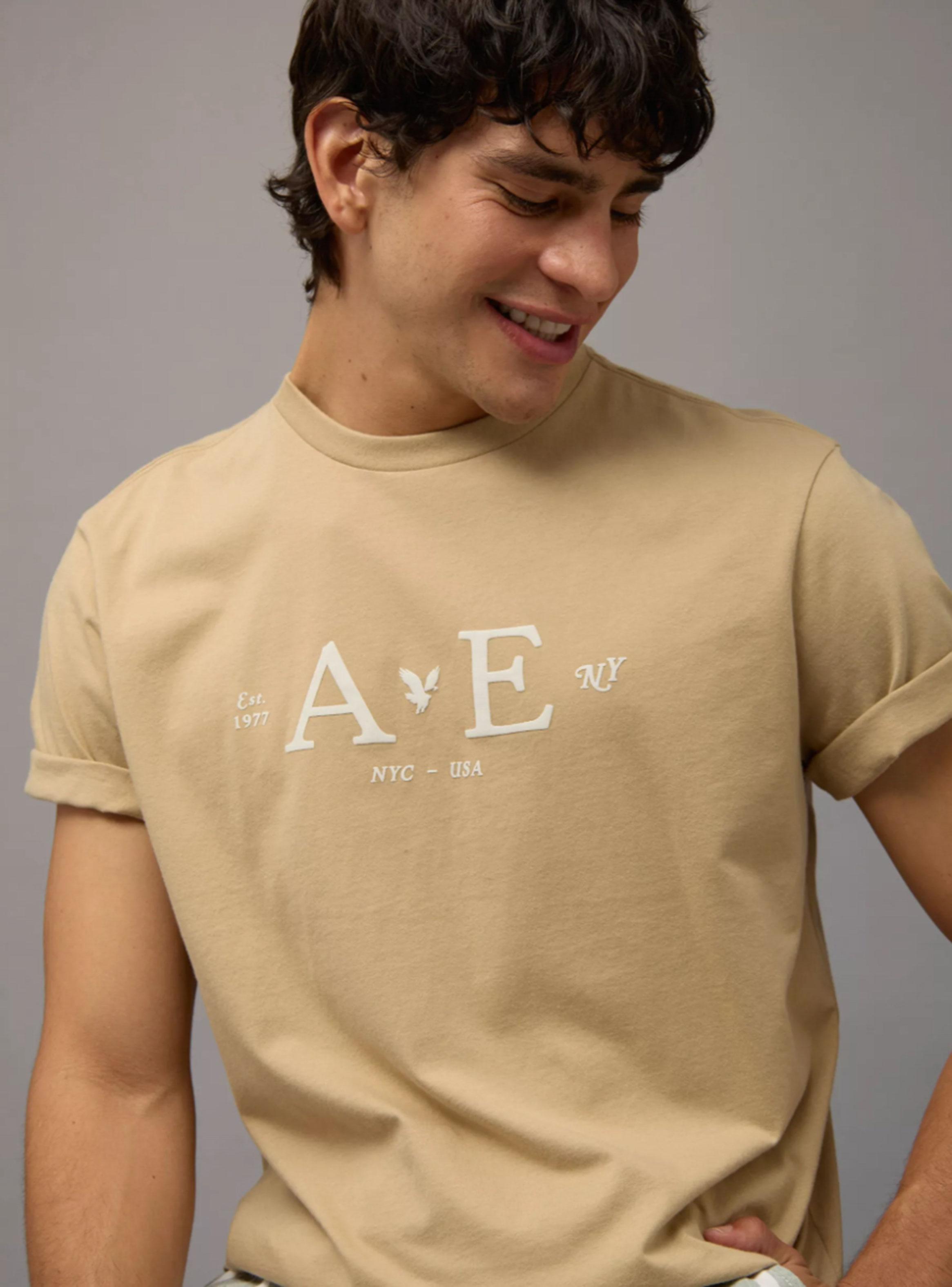 Polera Playera con Gráfico de Logo Fit Estándar-0