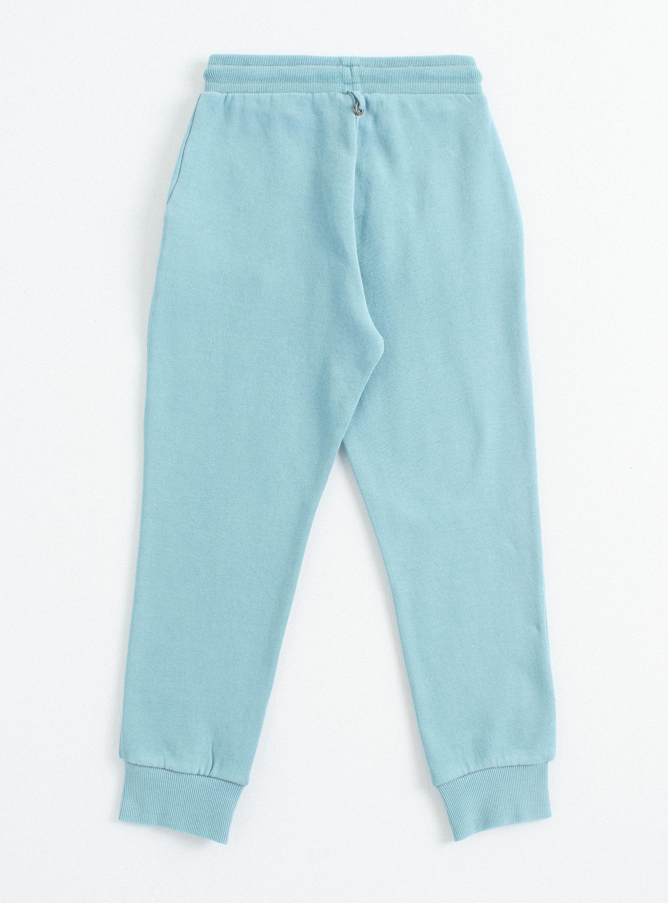Pantalón Buzo Print en Bolsillos Niña-1