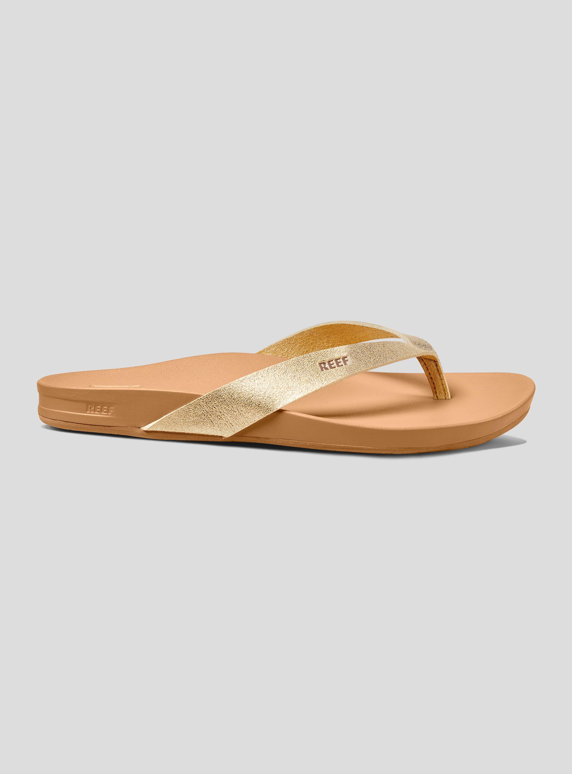 Sandalia Reef Cushion Bounce Court Dorado Mujer-0