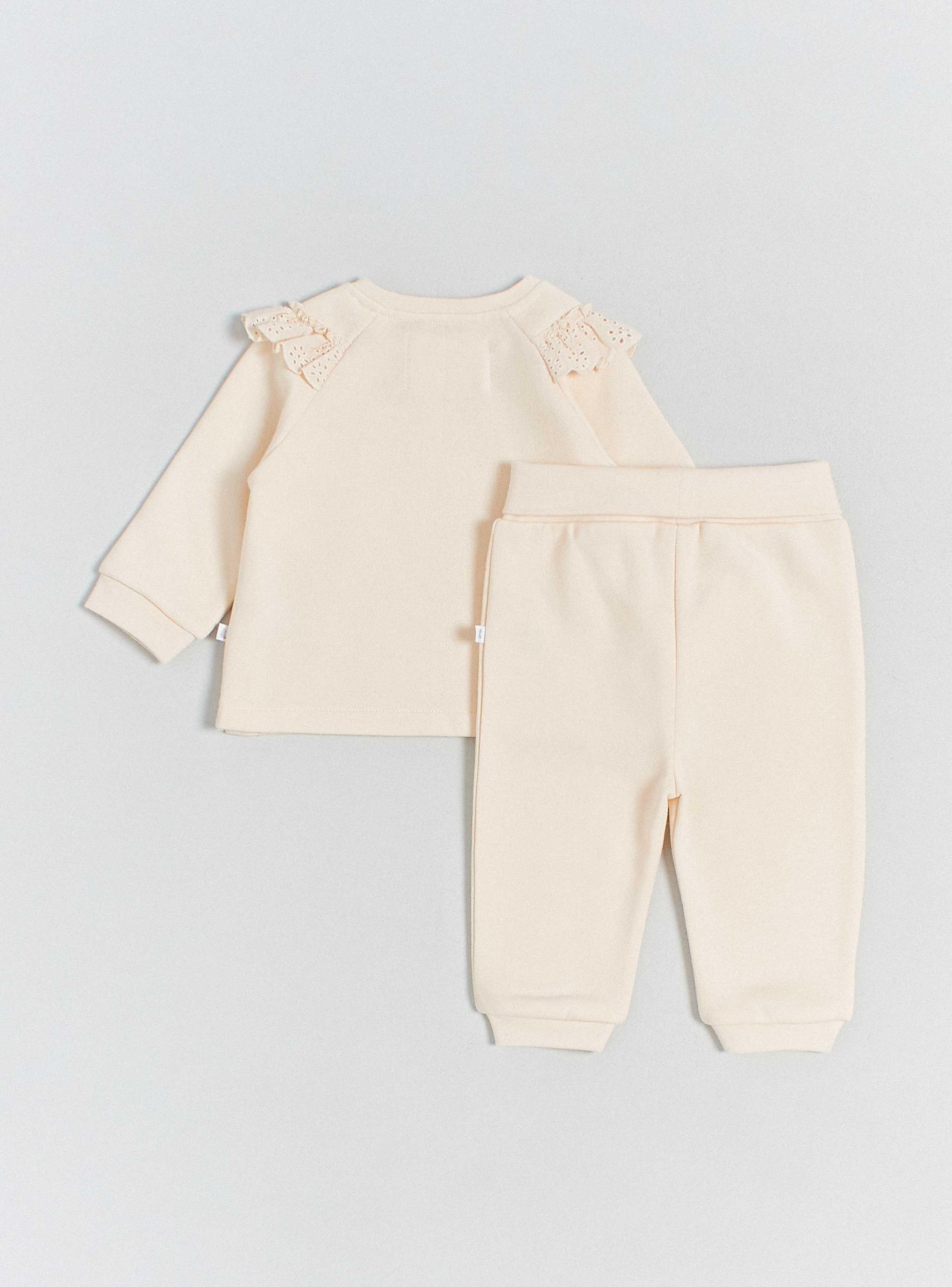 Buzo Con Vuelos En Broderie Y Jogger Liso-1
