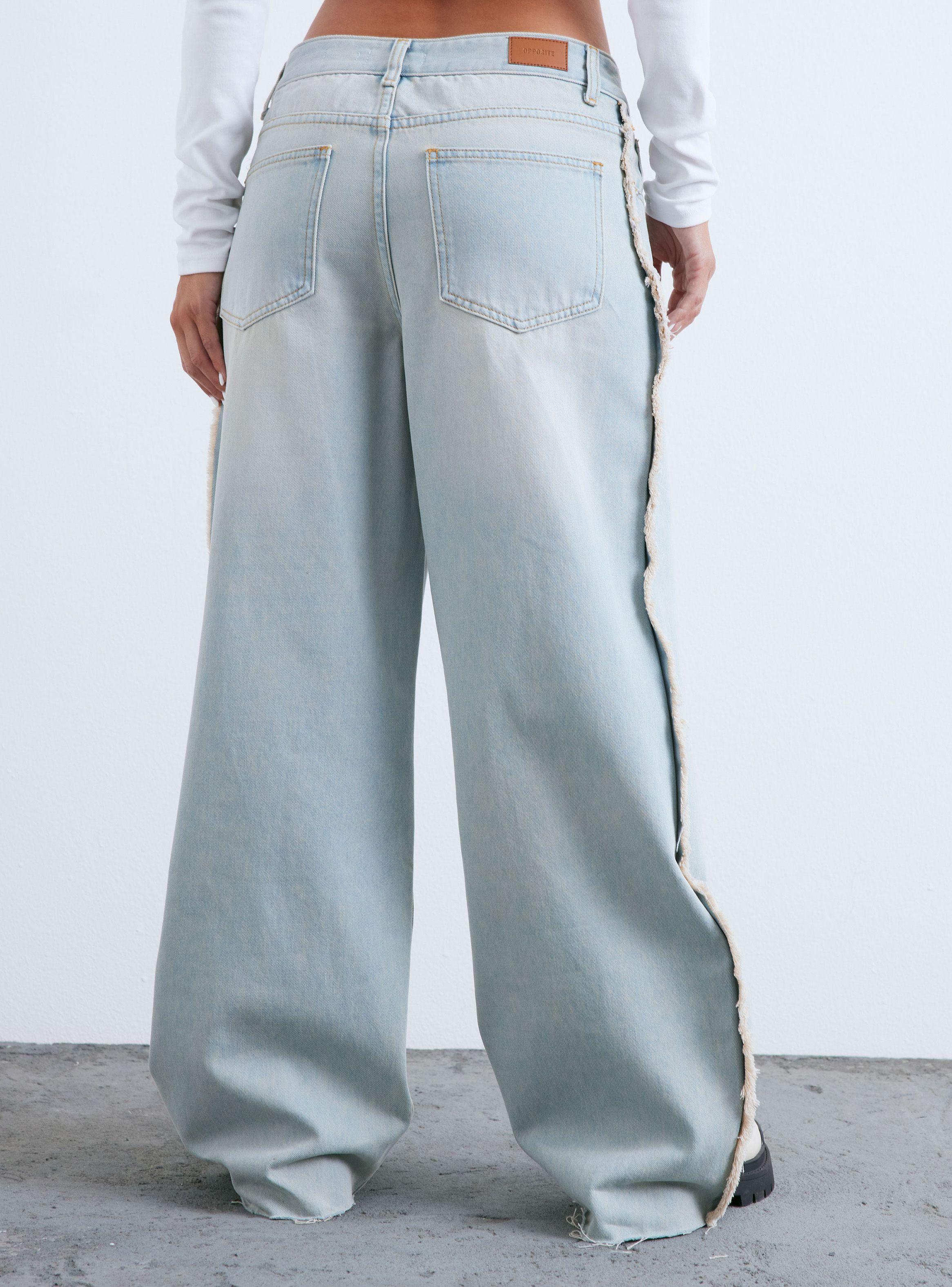 Jeans Con Terminación de Flecos en Costado-1