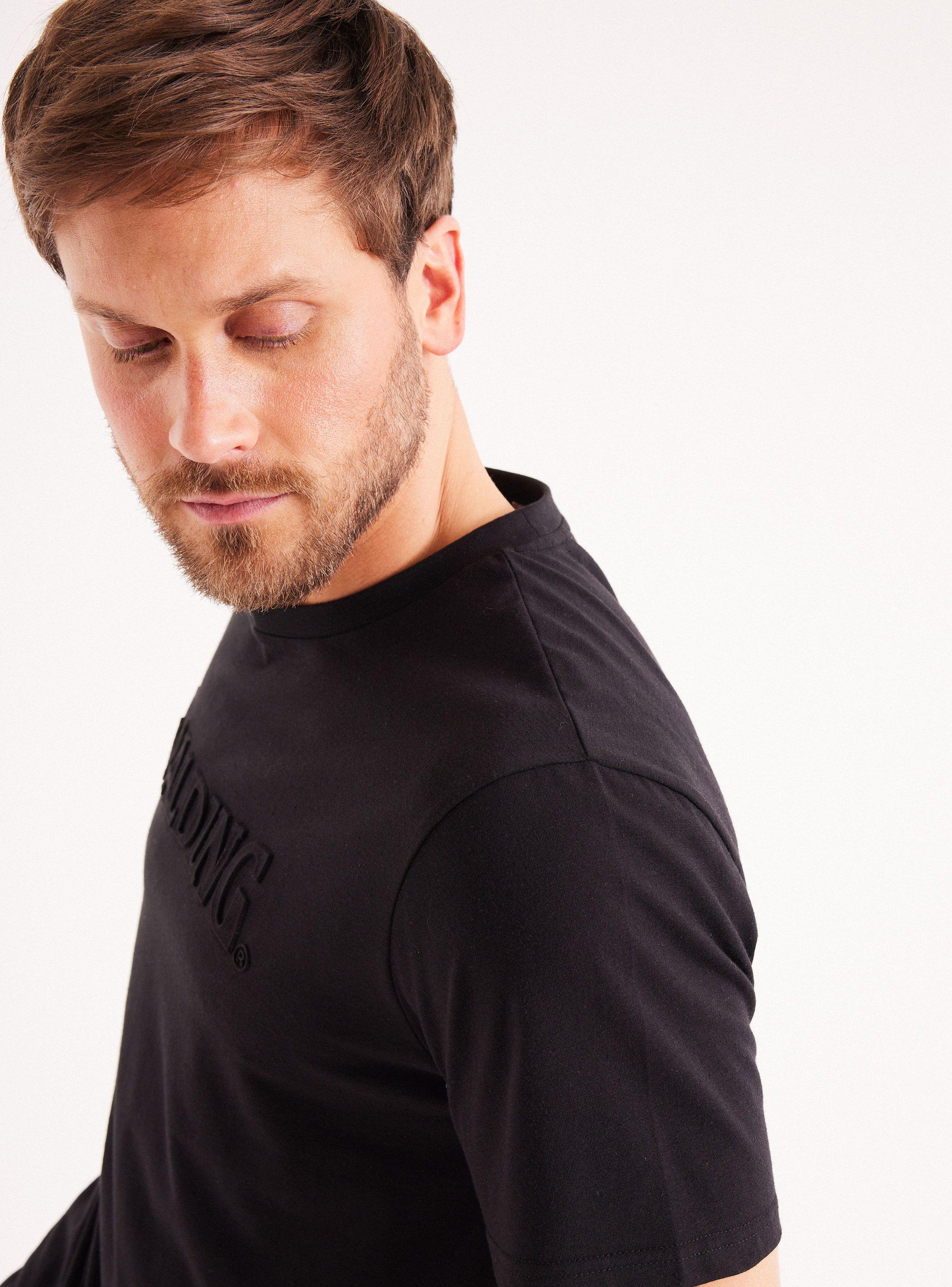 Polera Logotipo Sobre Relieve-3