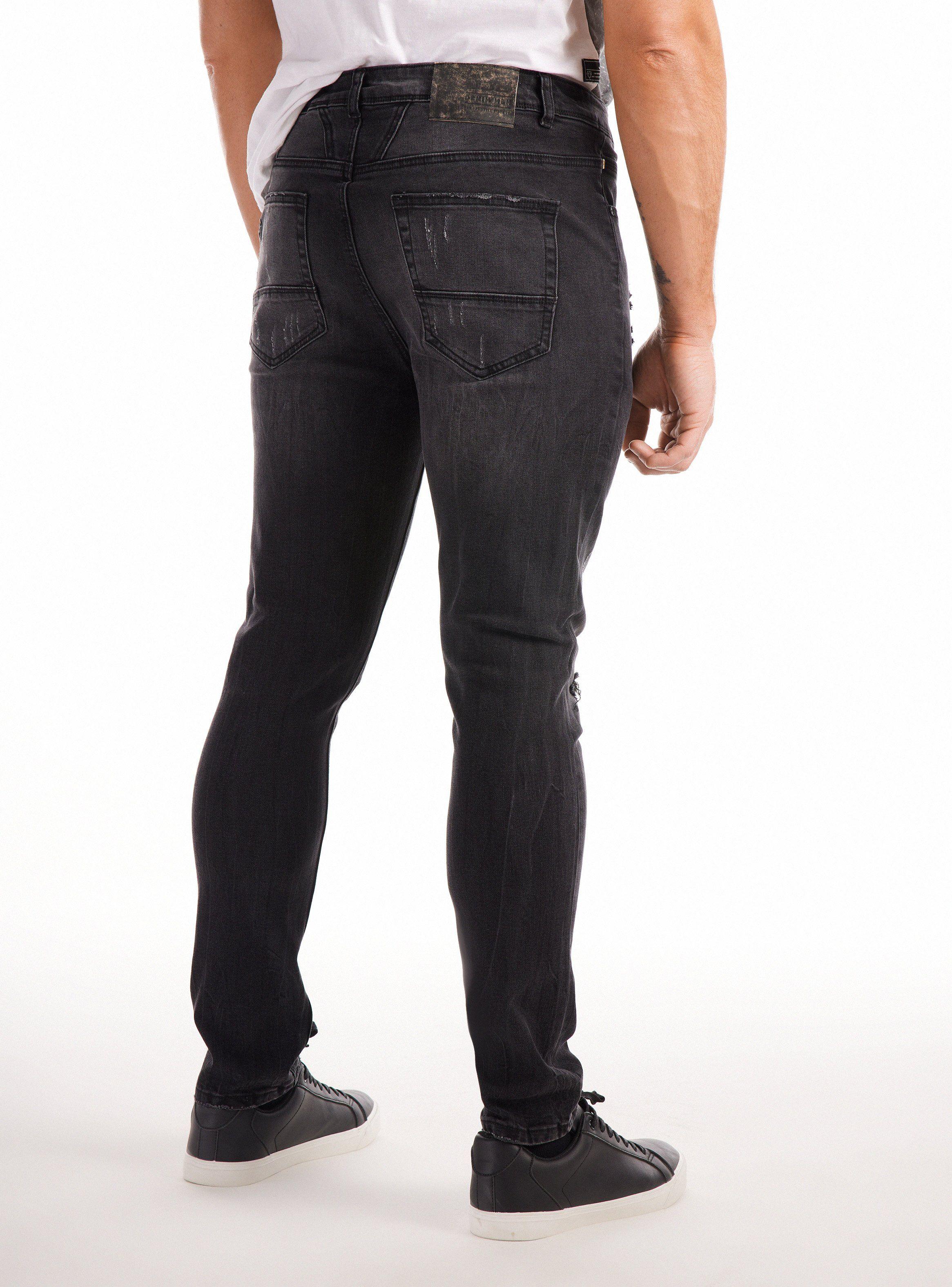 Jeans negro, desgastado y crackelado, roturas con costura-1