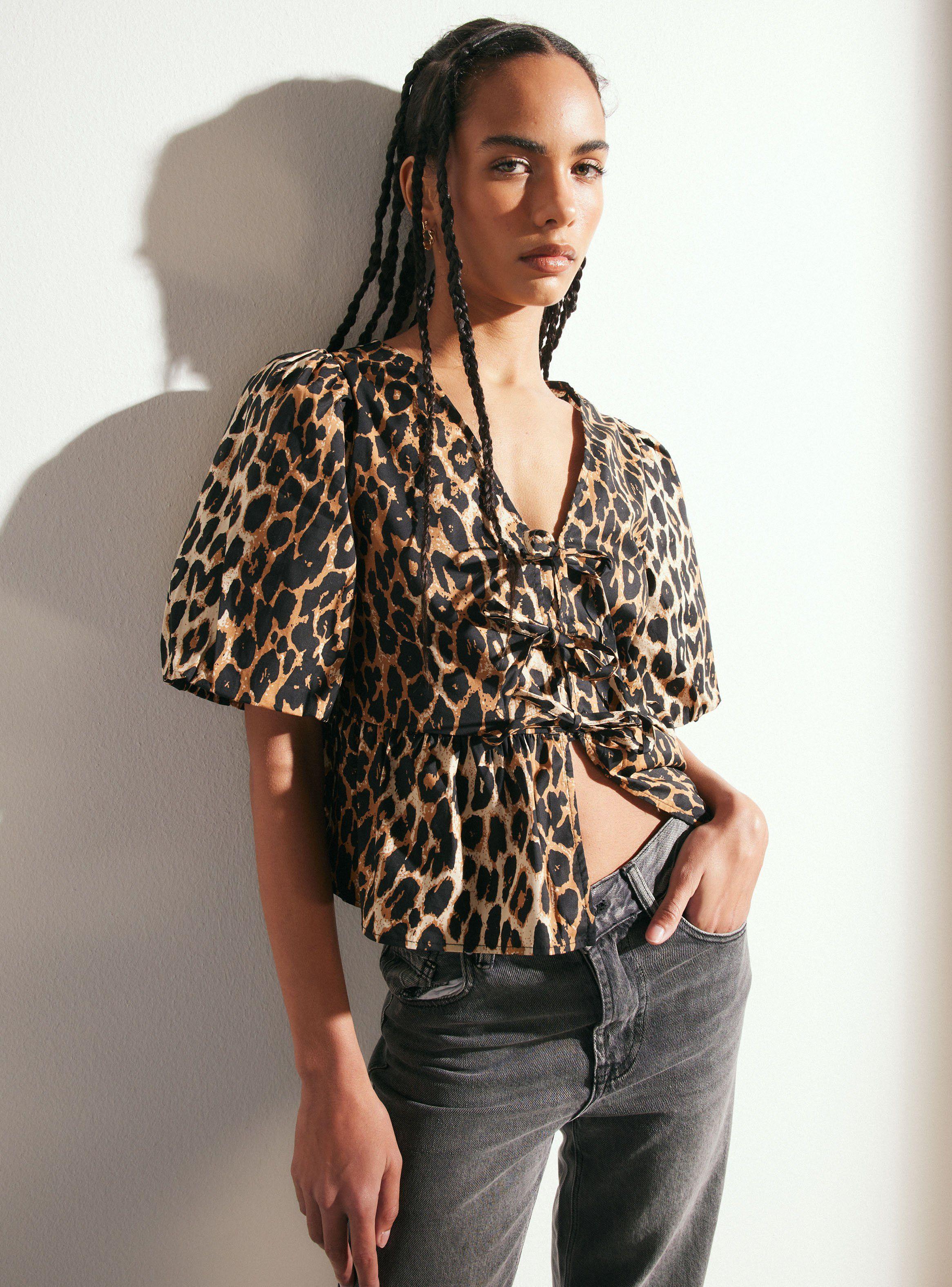 Blusa Peplum con Manga Aglobada y Lazos-0