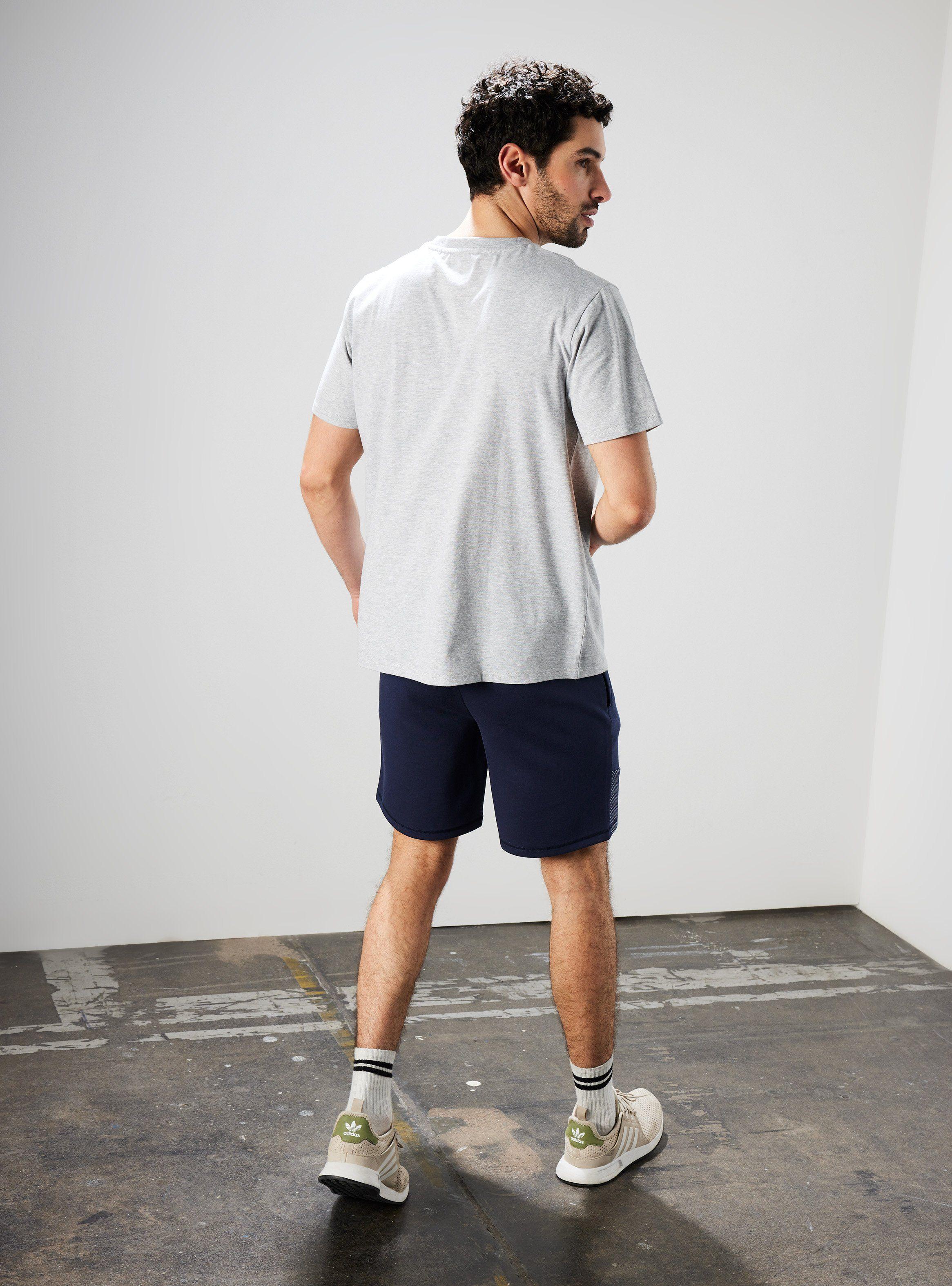 Polera Sobre Relieve Logo-5