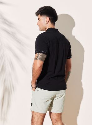 Imagen 2 del producto Polera Cuello Polo Estampado Silicona Espalda Manga Corta