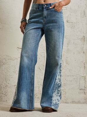 Imagen 1 del producto Jeans Estampado en Pieza Costado