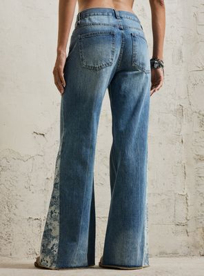 Imagen 2 del producto Jeans Estampado en Pieza Costado