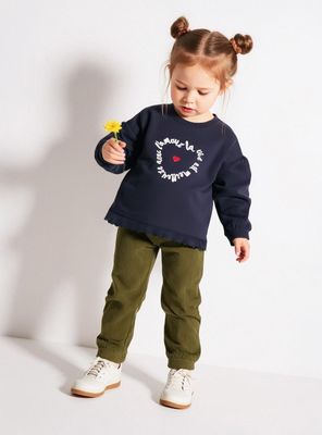 Polerón con Bordado y Terminación con Roulé