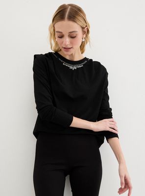 Polera Focalizada y Manga Larga