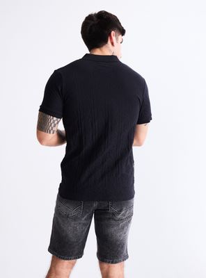 Imagen 2 del producto Polera Cuello Polo Tela con Patrón de Marca