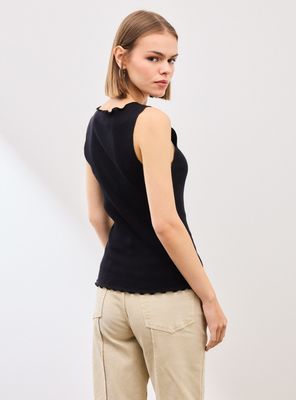 Imagen 2 del producto Polera Sin Mangas Tela Acanalada y Cierre Botones