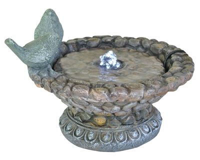 Fuente de agua con ave Outzen