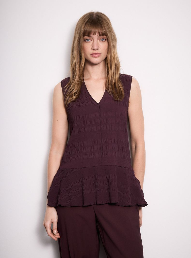 Blusa Corte Peplum con Vuelo